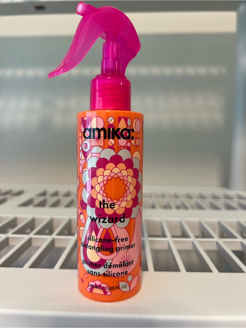 amika Silicone-Free Detangling Primer - Pink & Orange Floral Bottle